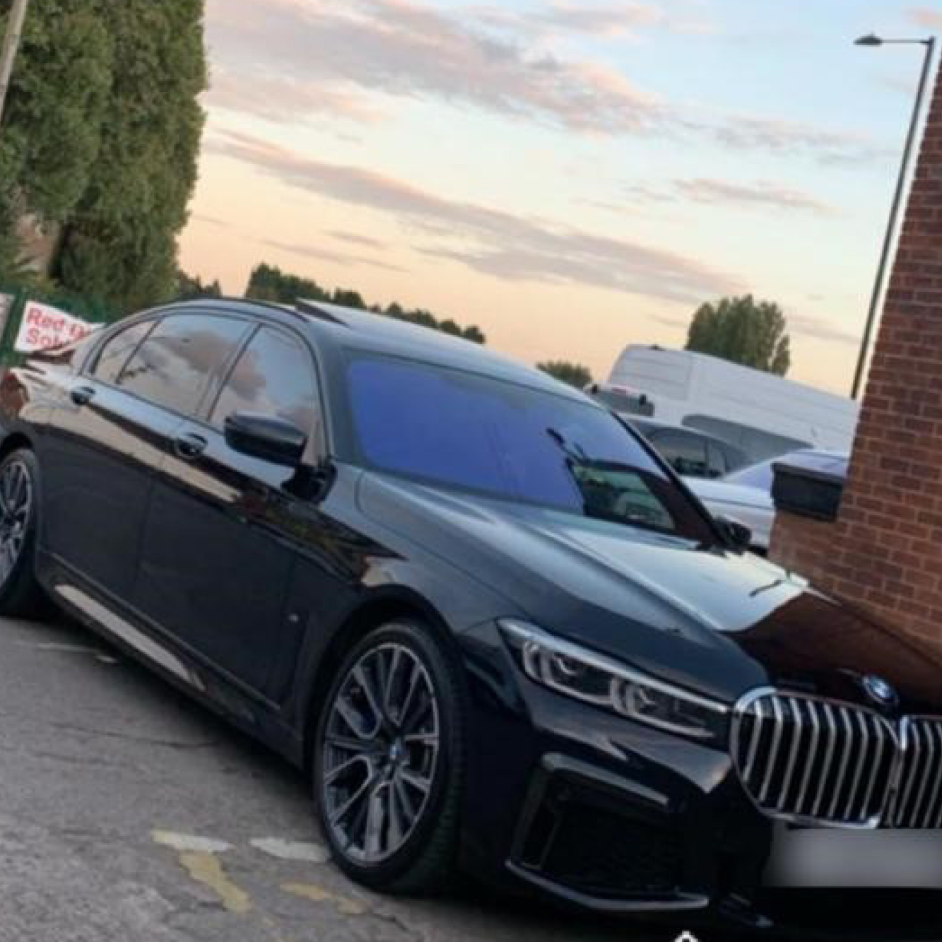 Black Luxury Car Side-Angle
